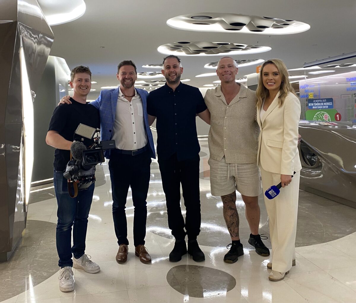 David Allen from Asthetica with clients and the TV crew from A Current Affair